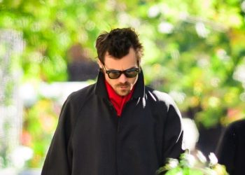 Harry Styles Wraps up a Perfect Fall Outfit With a Pop of Red