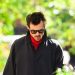 Harry Styles Wraps up a Perfect Fall Outfit With a Pop of Red