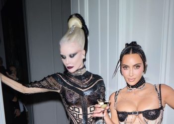 Kim Kardashian Wears a Bra Made of Hair—and Not Much Else