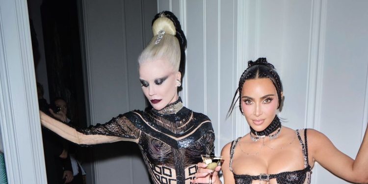 Kim Kardashian Wears a Bra Made of Hair—and Not Much Else