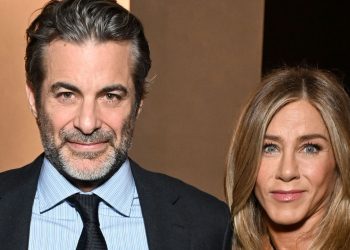 Jennifer Aniston Enlists Boyfriend Jim Curtis To Show Her Tips for Tackling Frizz