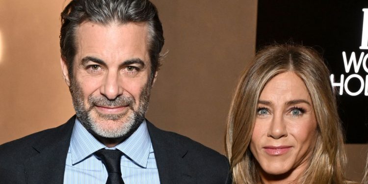 Jennifer Aniston Enlists Boyfriend Jim Curtis To Show Her Tips for Tackling Frizz