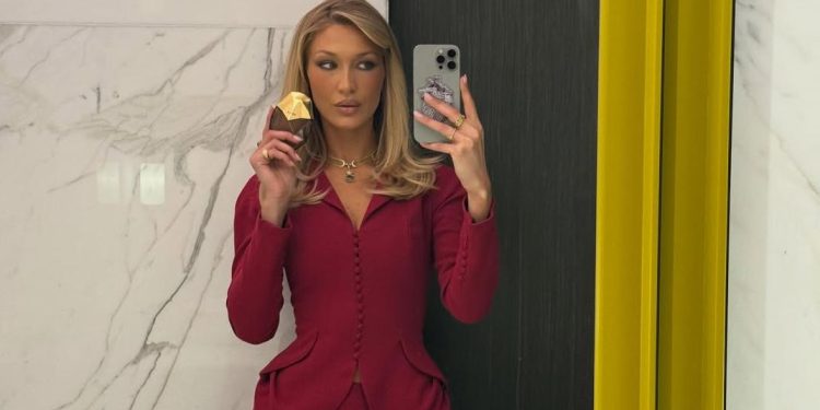 Bella Hadid Returns to Her Office Siren Roots