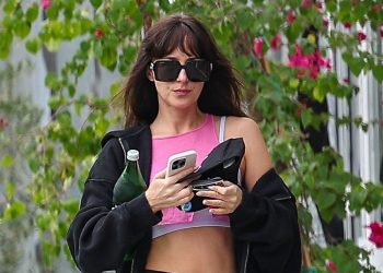 Dakota Johnson Briefly Ditches Boho for the Clean Girl Uniform